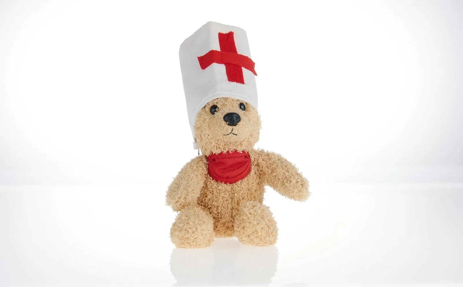 Teddybär mit Pflegehaube